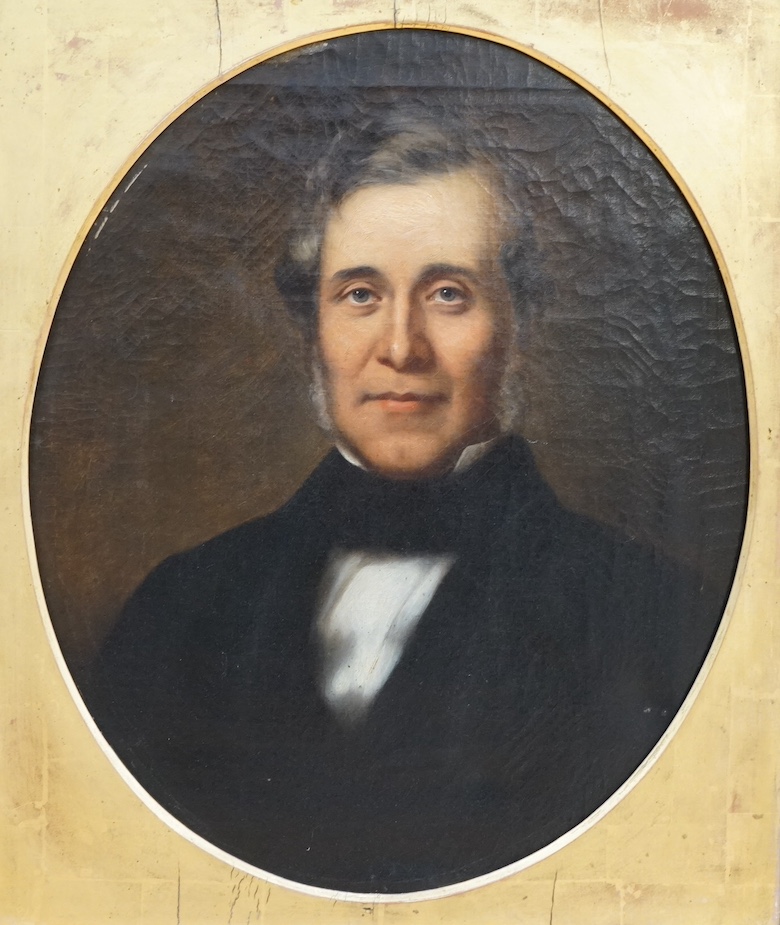 Mid 19th century, English School, feigned oval oil on canvas, Portrait of a gentleman, unsigned, 58 x 48cm, gilt framed. Condition - fair to good